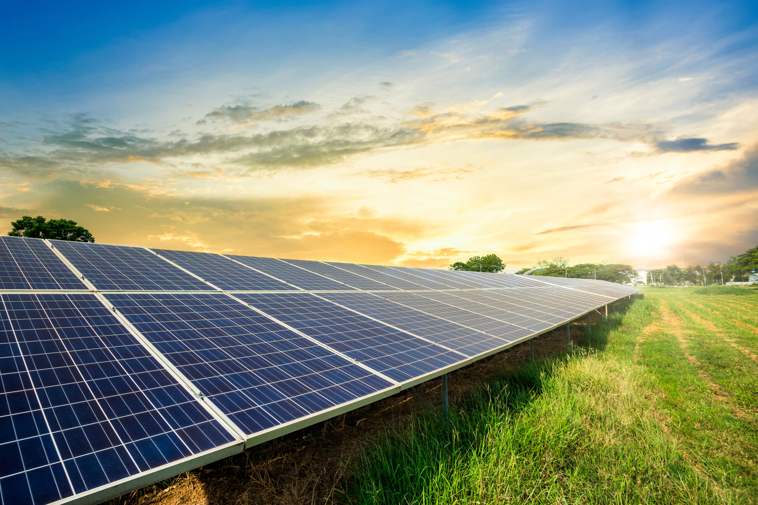 Solar panel cell on dramatic sunset sky background,clean Alterna
